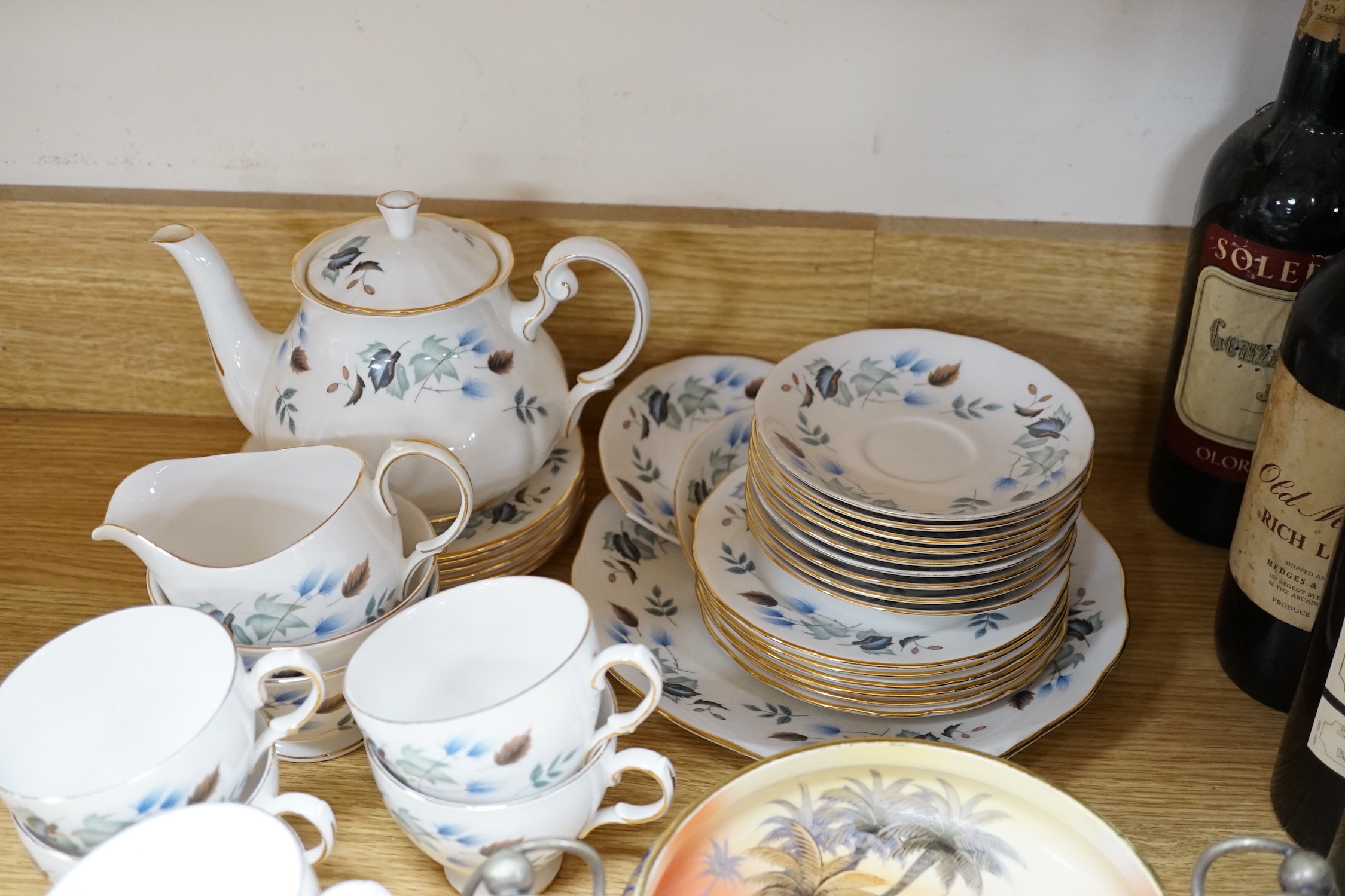 A Noritake ‘Egypt sunset scene’ bowl, a blue and white teapot and a Colclough teaset